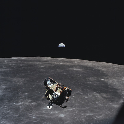 NASA photo of LM ascent stage approaching CSM with Earth in the background